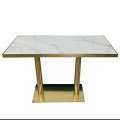 image of White marble table with gold legs